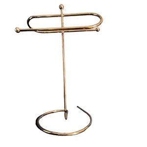 Silver colour free standing hand towel rack.